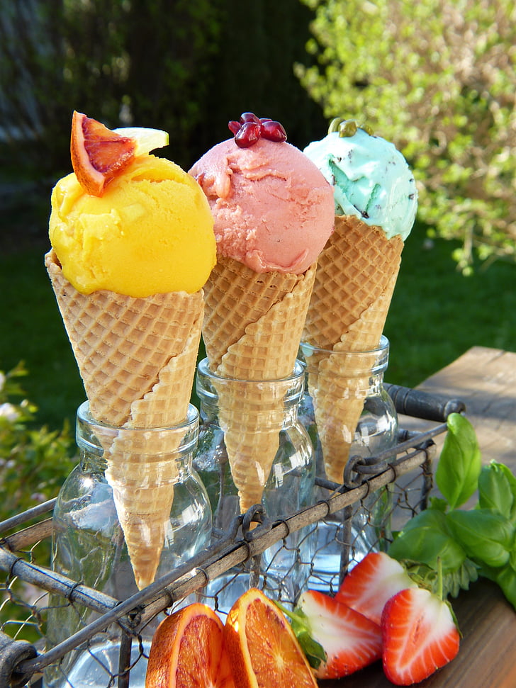 color photo of three ice cream cones